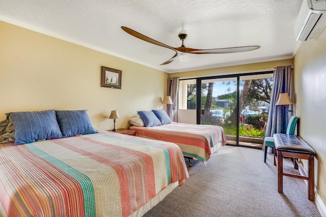 bedroom with ceiling fan, carpet floors, a textured ceiling, a wall mounted AC, and access to outside