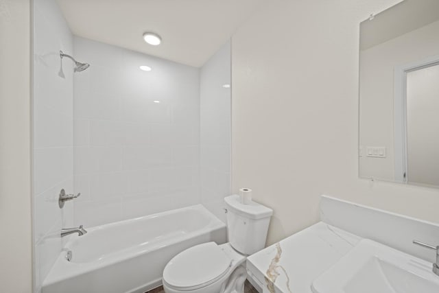 full bathroom with  shower combination, a sink, and toilet