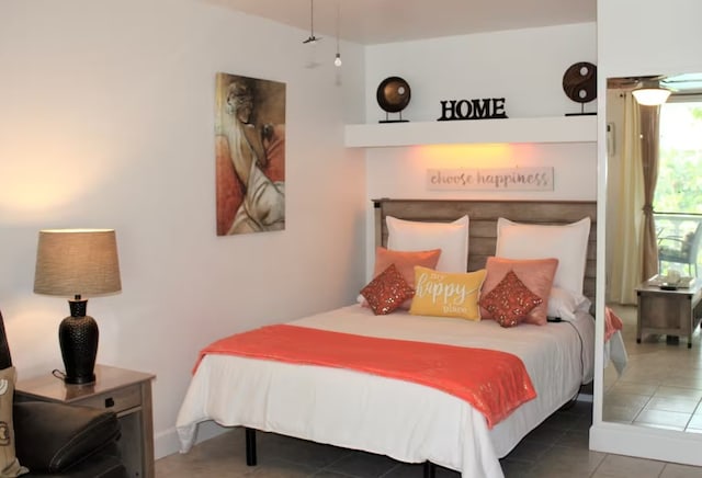 bedroom featuring tile patterned floors