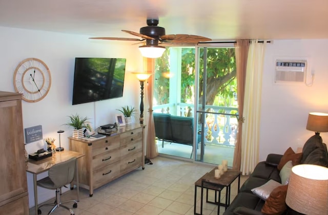 living room with a wall unit AC and ceiling fan