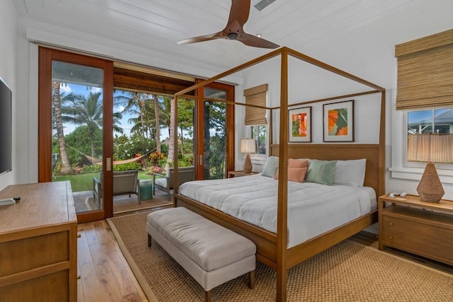 bedroom featuring access to outside and light wood-style flooring