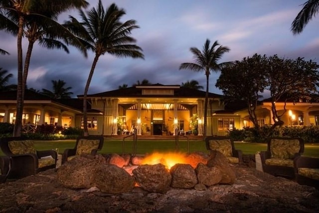 exterior space with an outdoor fire pit