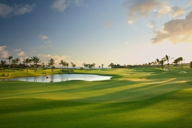 view of community with a water view and golf course view