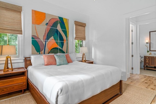 bedroom featuring wood finished floors