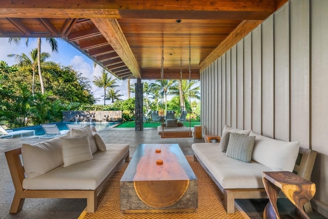 view of patio featuring outdoor lounge area and an outdoor pool