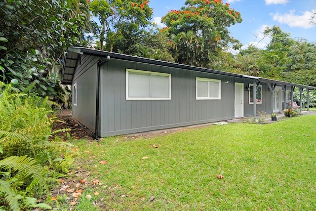 exterior space with a front yard