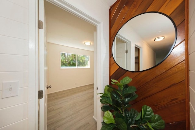 hallway with wood finished floors