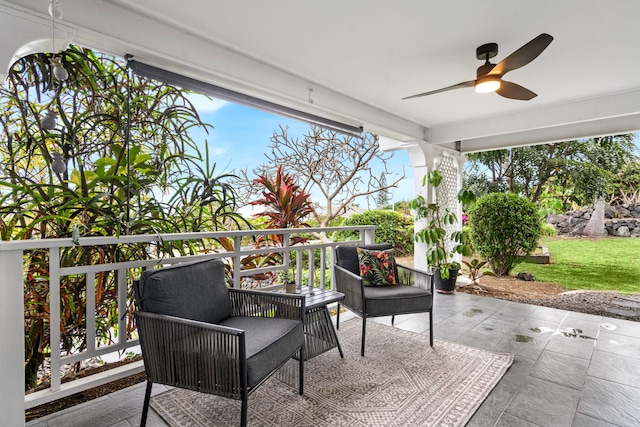 view of patio featuring ceiling fan