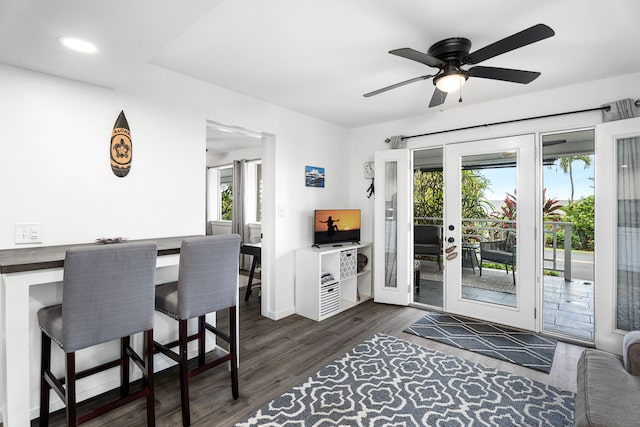 interior space featuring recessed lighting, baseboards, a ceiling fan, and dark wood-style flooring