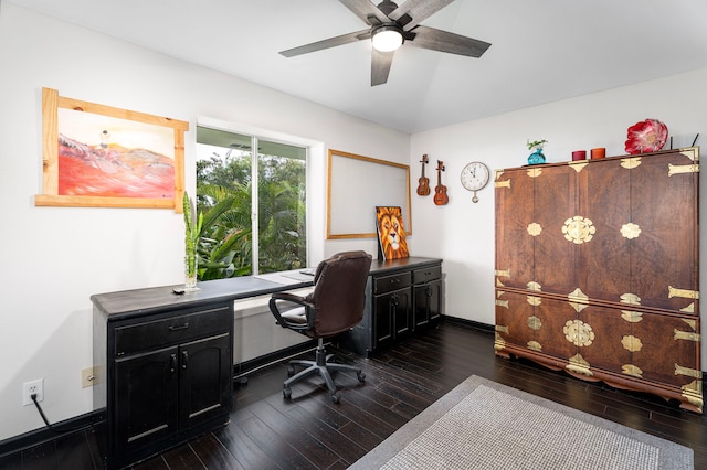 office area featuring baseboards, ceiling fan, and dark wood-style floors