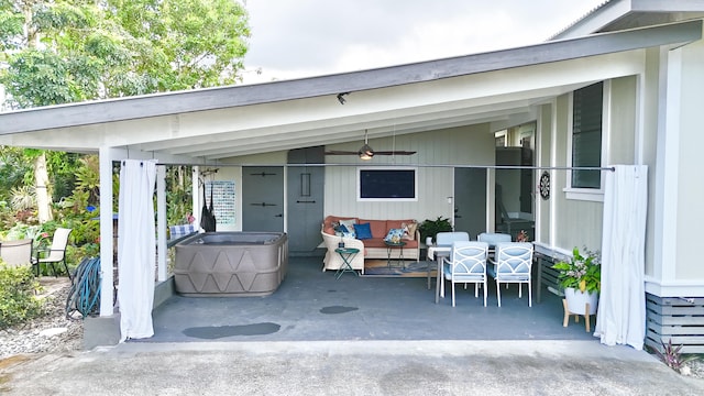 view of patio with an outdoor living space, ceiling fan, and outdoor dining space