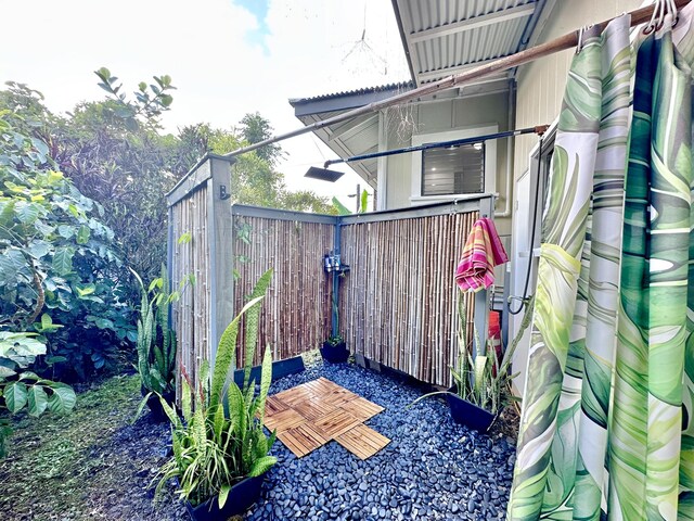 view of patio / terrace featuring fence