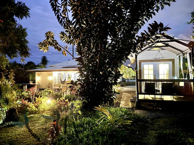 view of yard featuring french doors