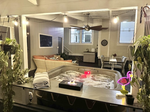 kitchen with a wealth of natural light and a ceiling fan