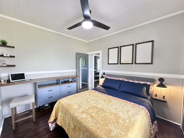 bedroom featuring a ceiling fan, ornamental molding, and dark wood-style flooring