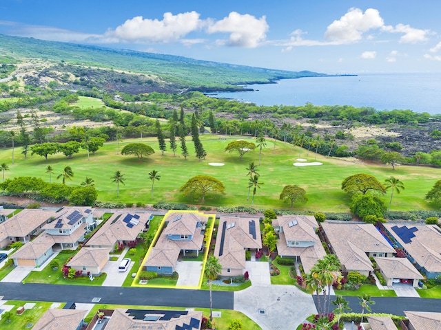 birds eye view of property with a water view, a residential view, and view of golf course