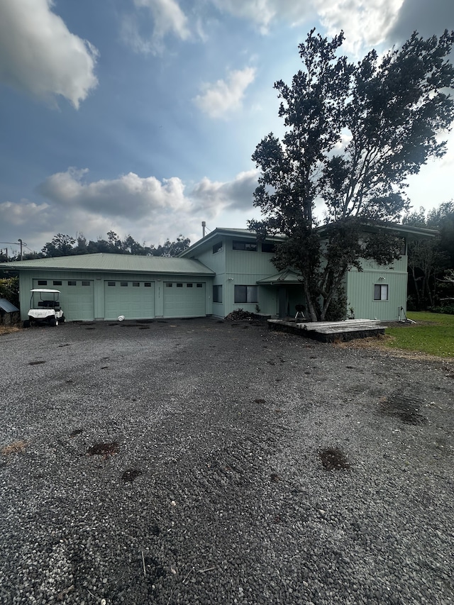 exterior space with a garage and driveway