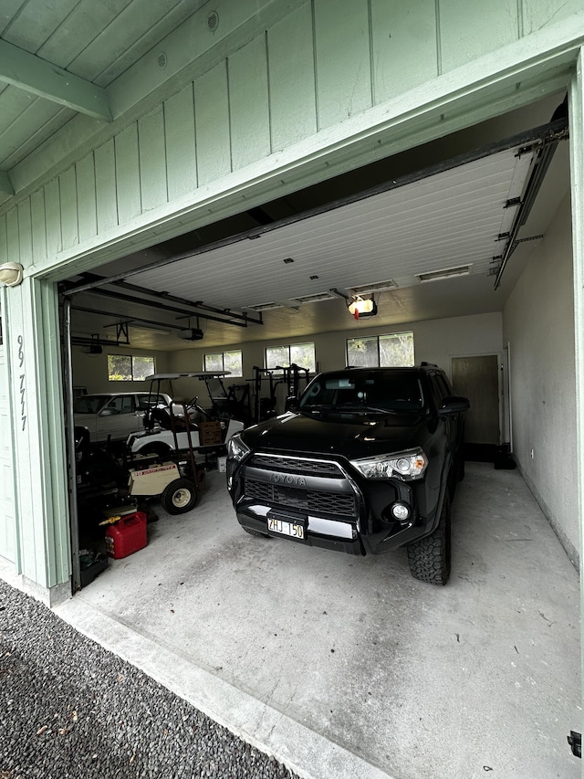 garage featuring a garage door opener