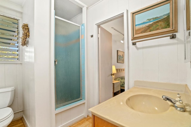 4620 Anolani St, Kapaa, HI 96746 - full bathroom with toilet, a shower stall, wood finished floors, and vanity