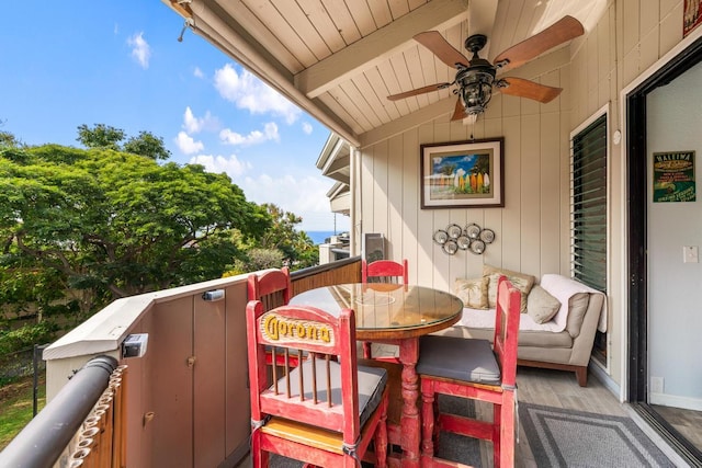 balcony featuring ceiling fan