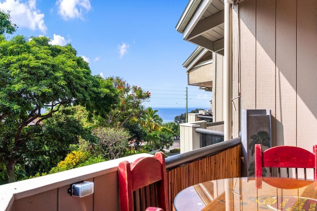 balcony featuring a water view