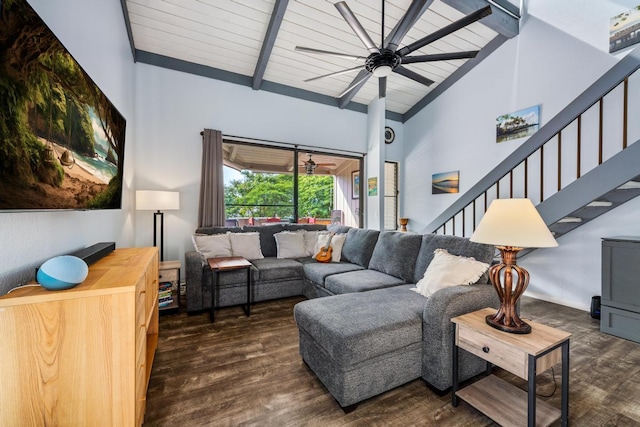 living room with beam ceiling, high vaulted ceiling, a ceiling fan, wood finished floors, and stairway