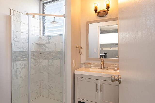 full bath featuring vanity and a stall shower