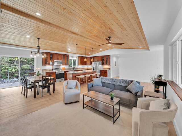 living area with recessed lighting, wood ceiling, vaulted ceiling, and light wood finished floors