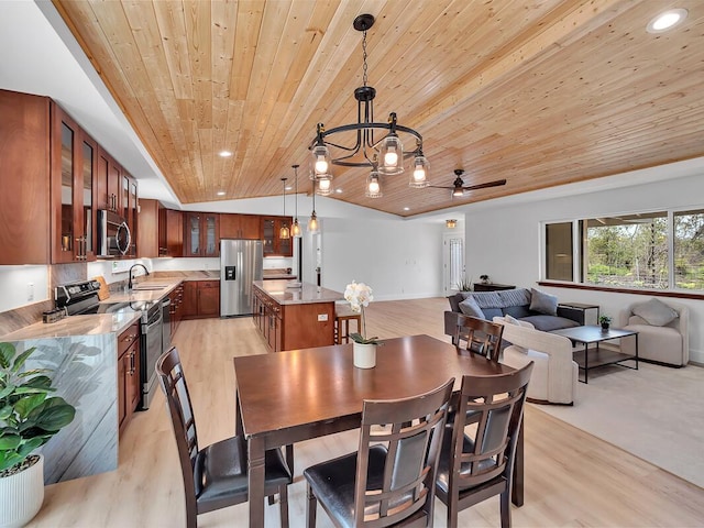 dining space with recessed lighting, wood ceiling, vaulted ceiling, and light wood-style flooring