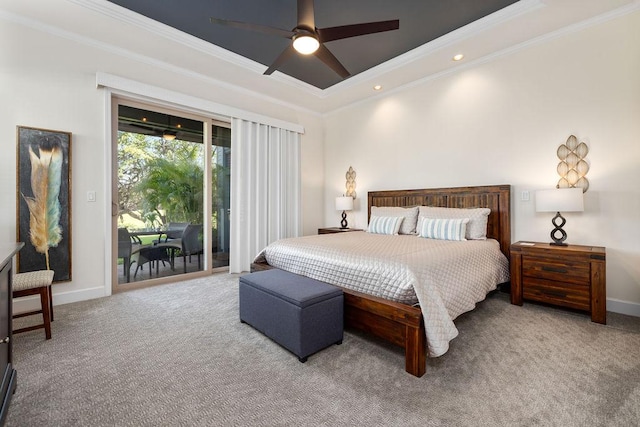 carpeted bedroom featuring access to exterior, ceiling fan, baseboards, and ornamental molding