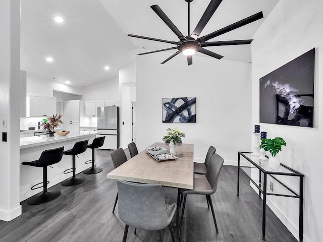 dining area with baseboards, high vaulted ceiling, dark wood-type flooring, and recessed lighting