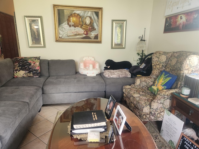 living room with tile patterned floors