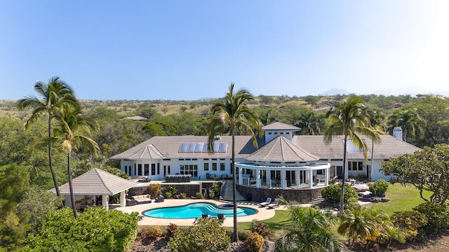 back of house featuring an outdoor pool, a gazebo, a patio area, and a pergola