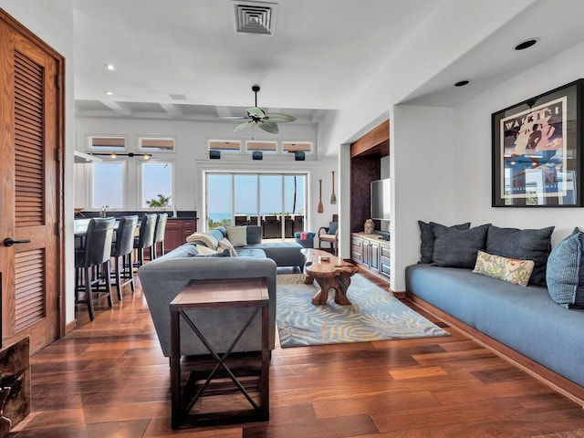 living room featuring a ceiling fan, recessed lighting, dark wood-style floors, and visible vents