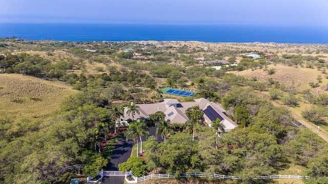 bird's eye view featuring a wooded view