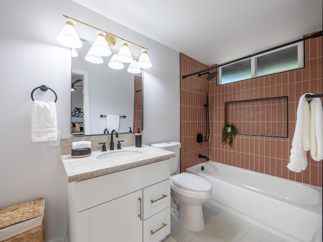 full bathroom featuring tile patterned floors, toilet, tub / shower combination, and vanity