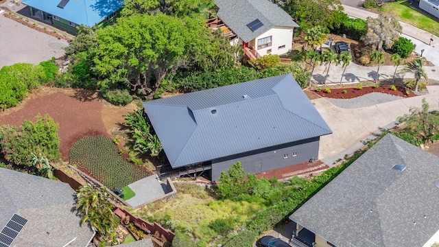 birds eye view of property with a residential view