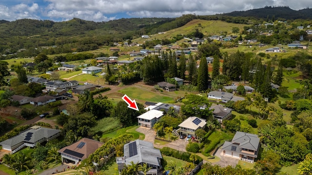 aerial view featuring a mountain view and a residential view