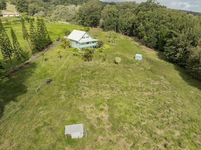 aerial view featuring a forest view