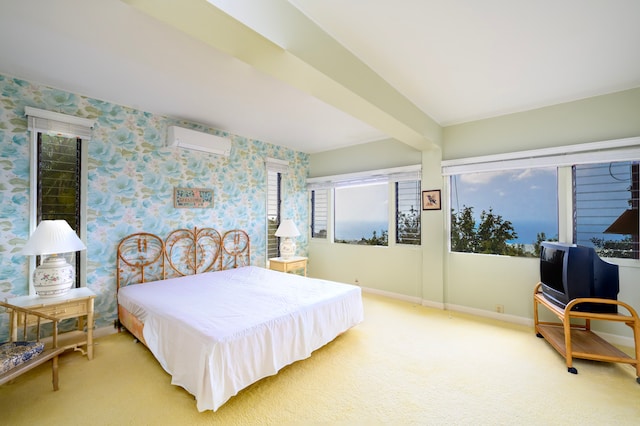 bedroom with carpet floors, a wall mounted air conditioner, baseboards, and wallpapered walls