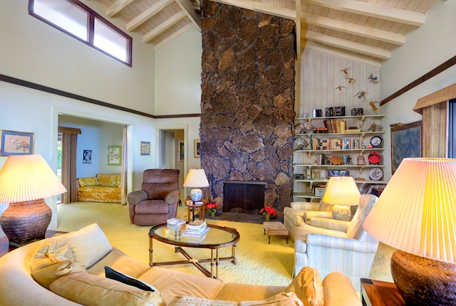 carpeted living area with lofted ceiling with beams, wood ceiling, and a fireplace