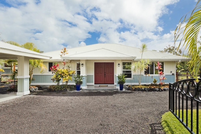 single story home with fence