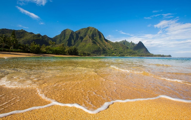 property view of mountains featuring a water view