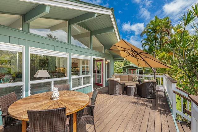 wooden deck featuring outdoor lounge area and outdoor dining area