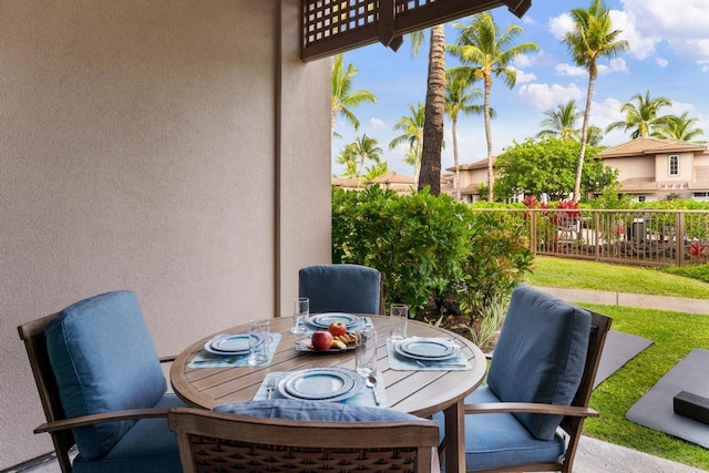 view of patio / terrace featuring outdoor dining area and fence