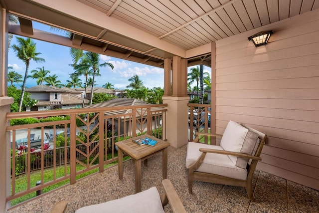 view of patio featuring a balcony