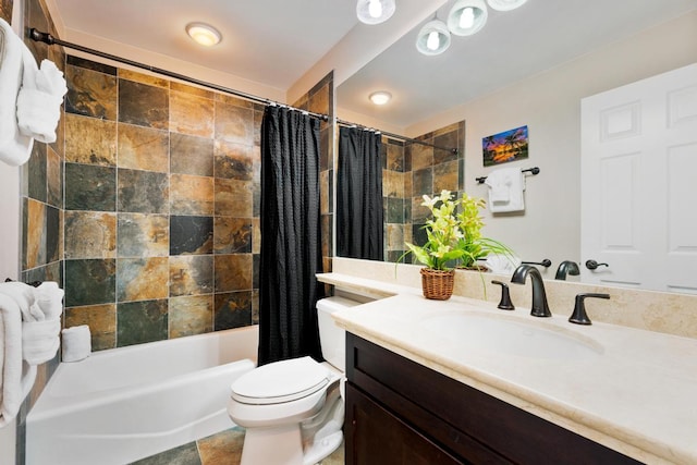 bathroom with vanity, toilet, and shower / bath combo