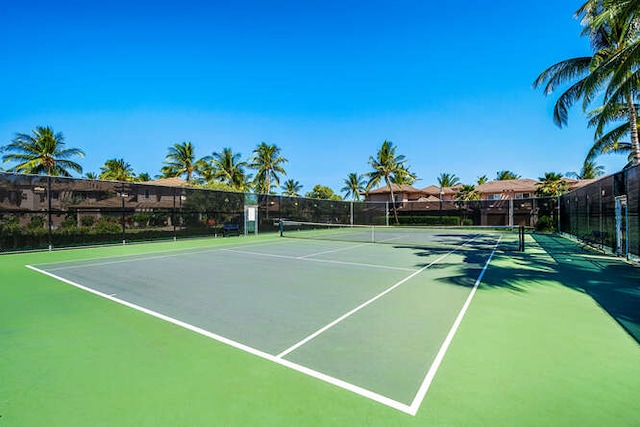 view of sport court with fence