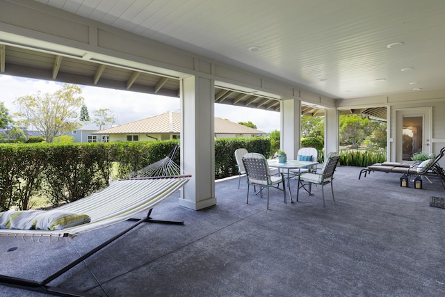 view of patio with outdoor dining area