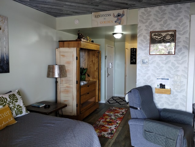 bedroom with wood finished floors